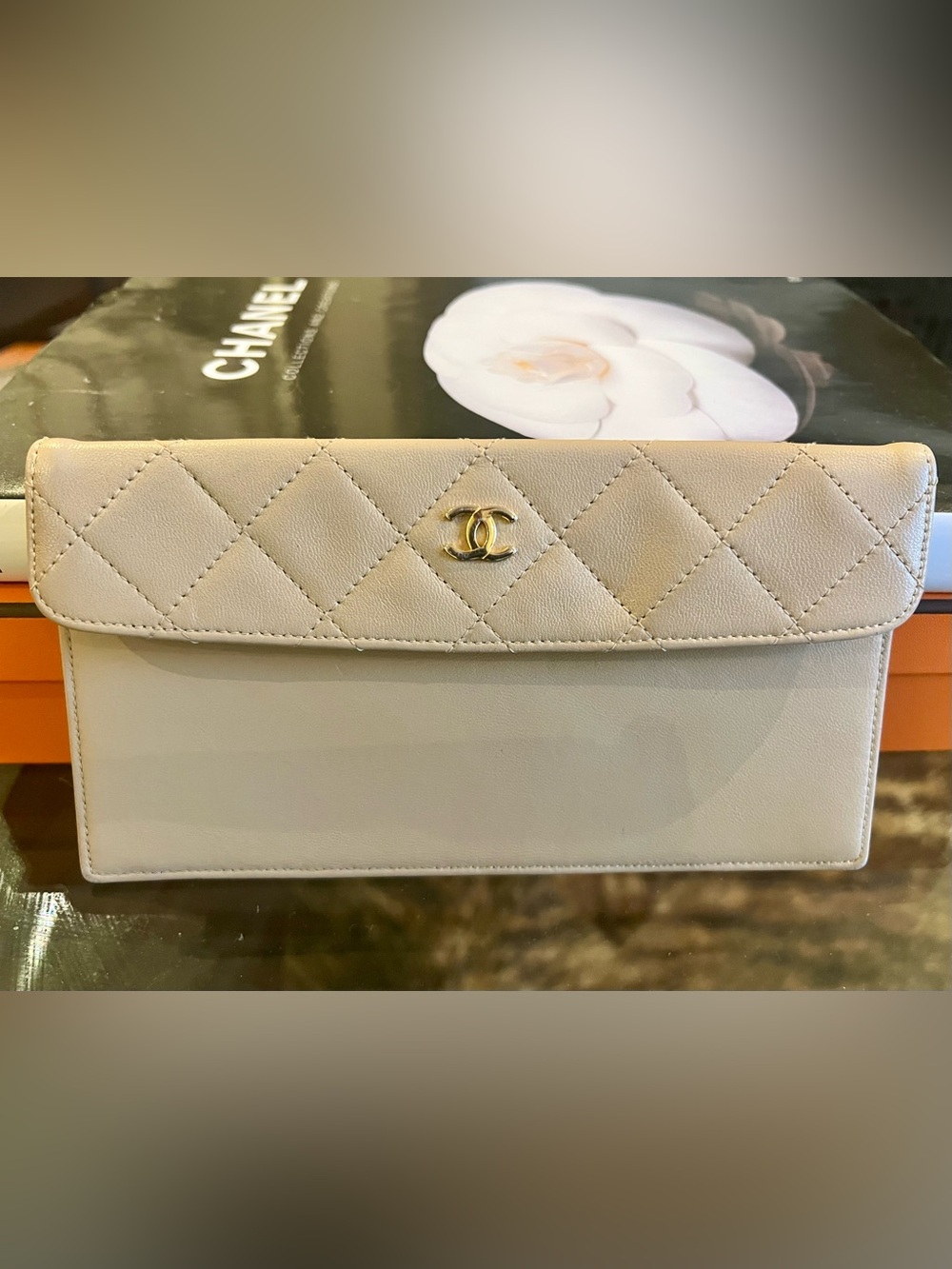 CHANEL Quilted Leather Clutch Pouch in Cream with Gold CC